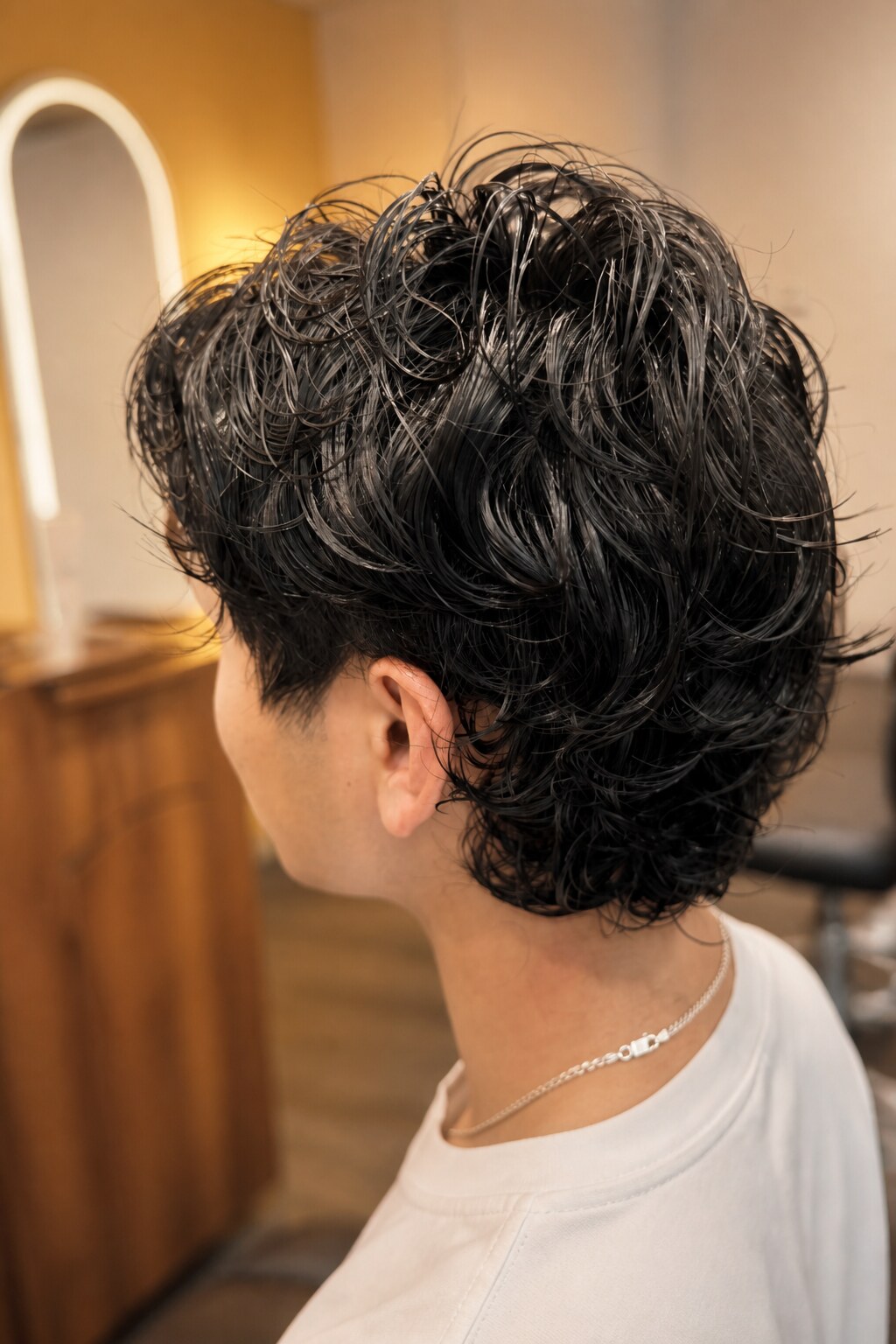 Textured wet-look perm finish